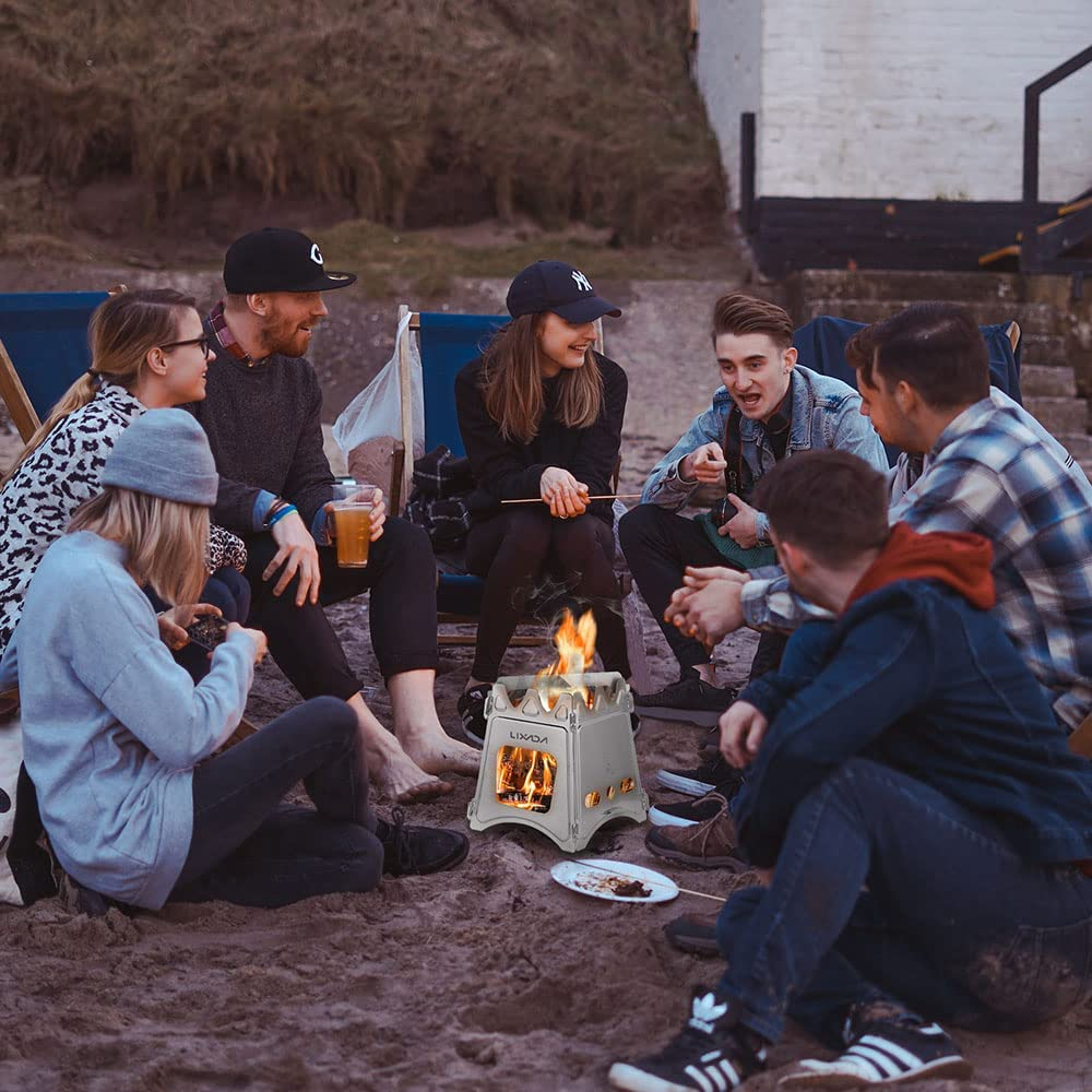 campers gathered around small cooking stove